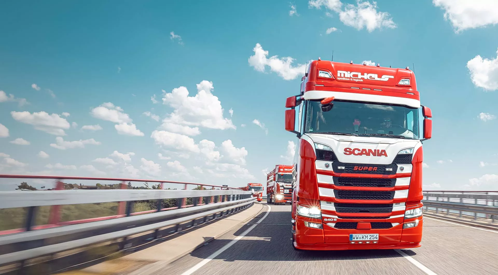 Transport trucks on country roads